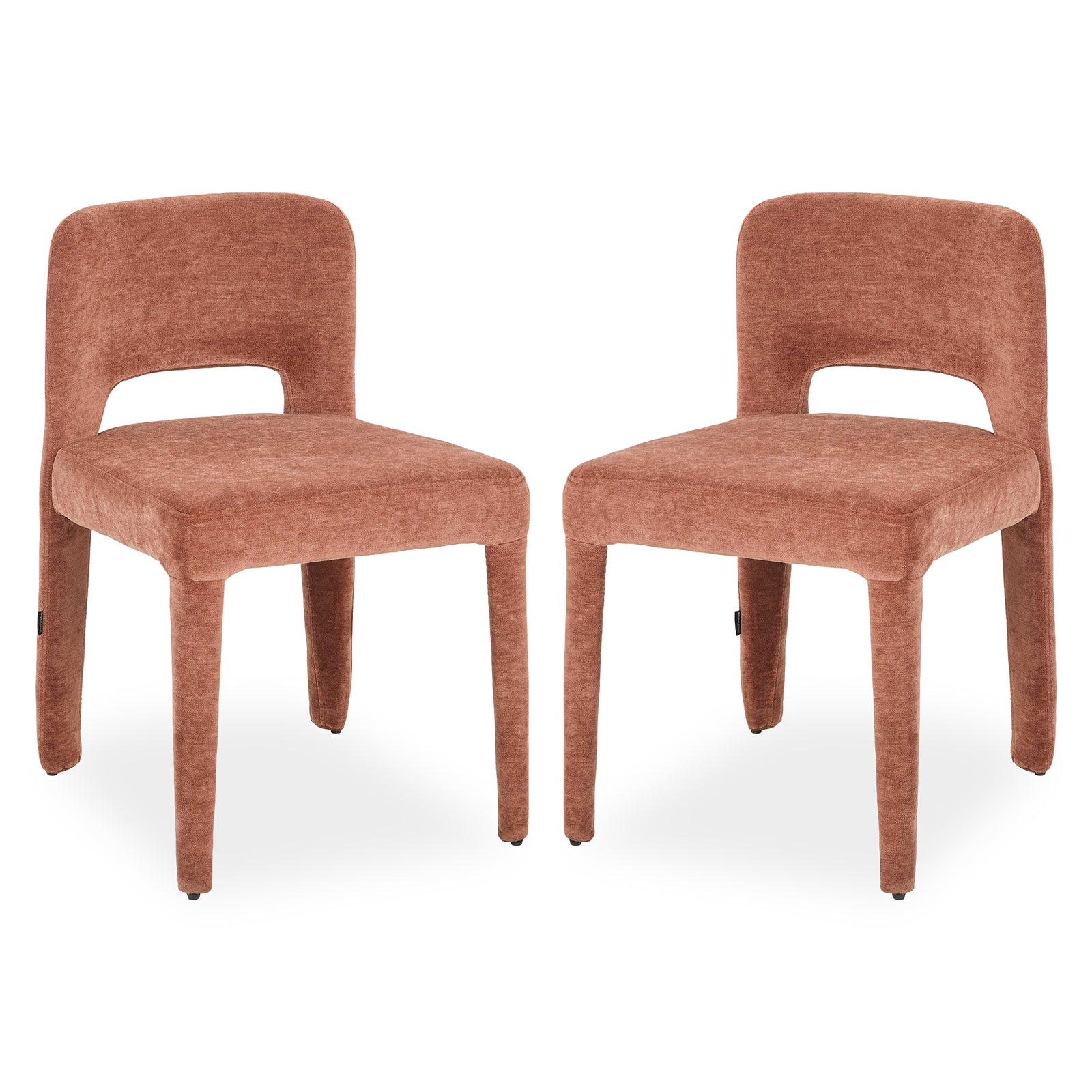 Two terracotta upholstered dining chairs with curved backs, cut-out detail and tapered legs