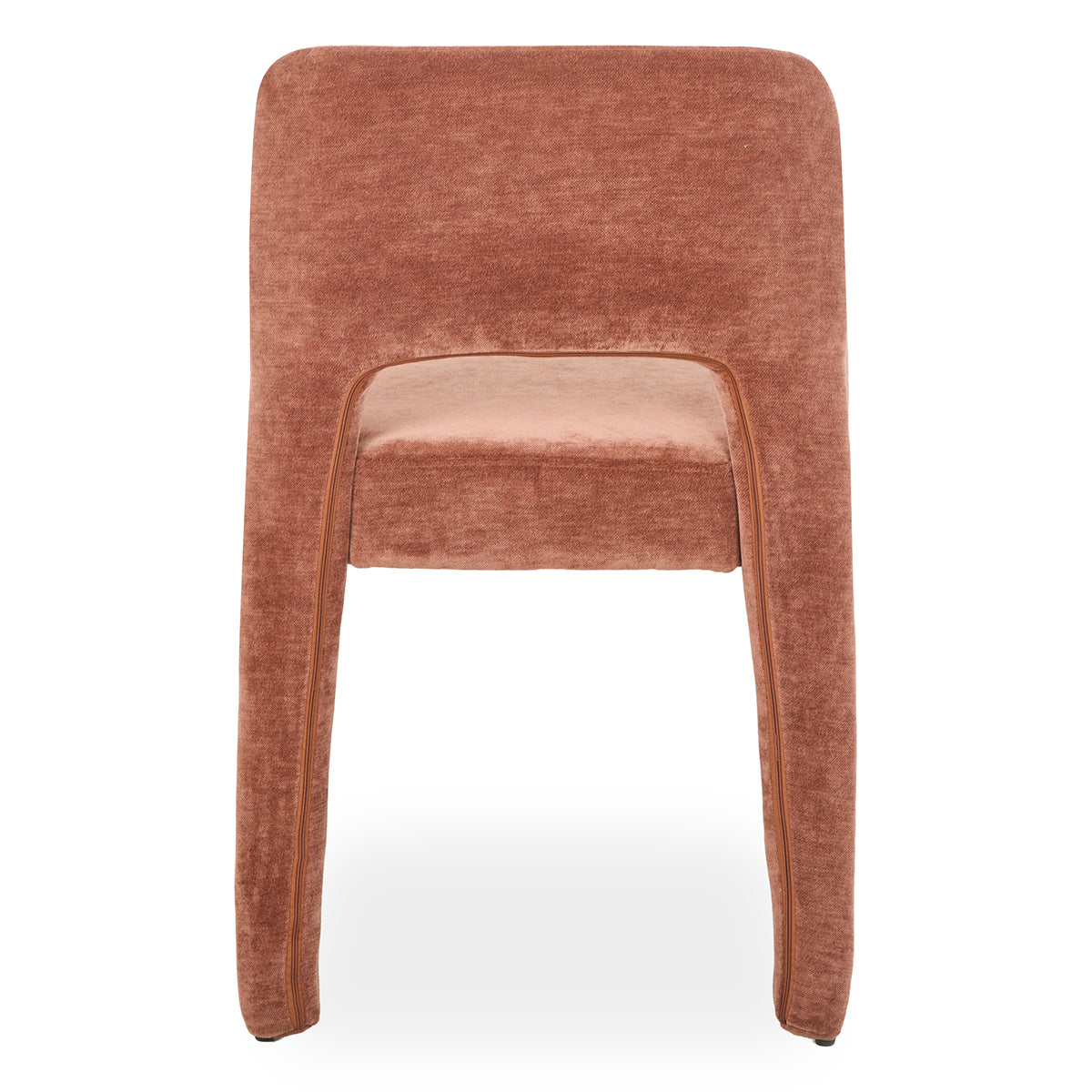 Edris upholstered dining chair in terracotta with curved backrest and seat, featuring piped edges and fabric-covered legs