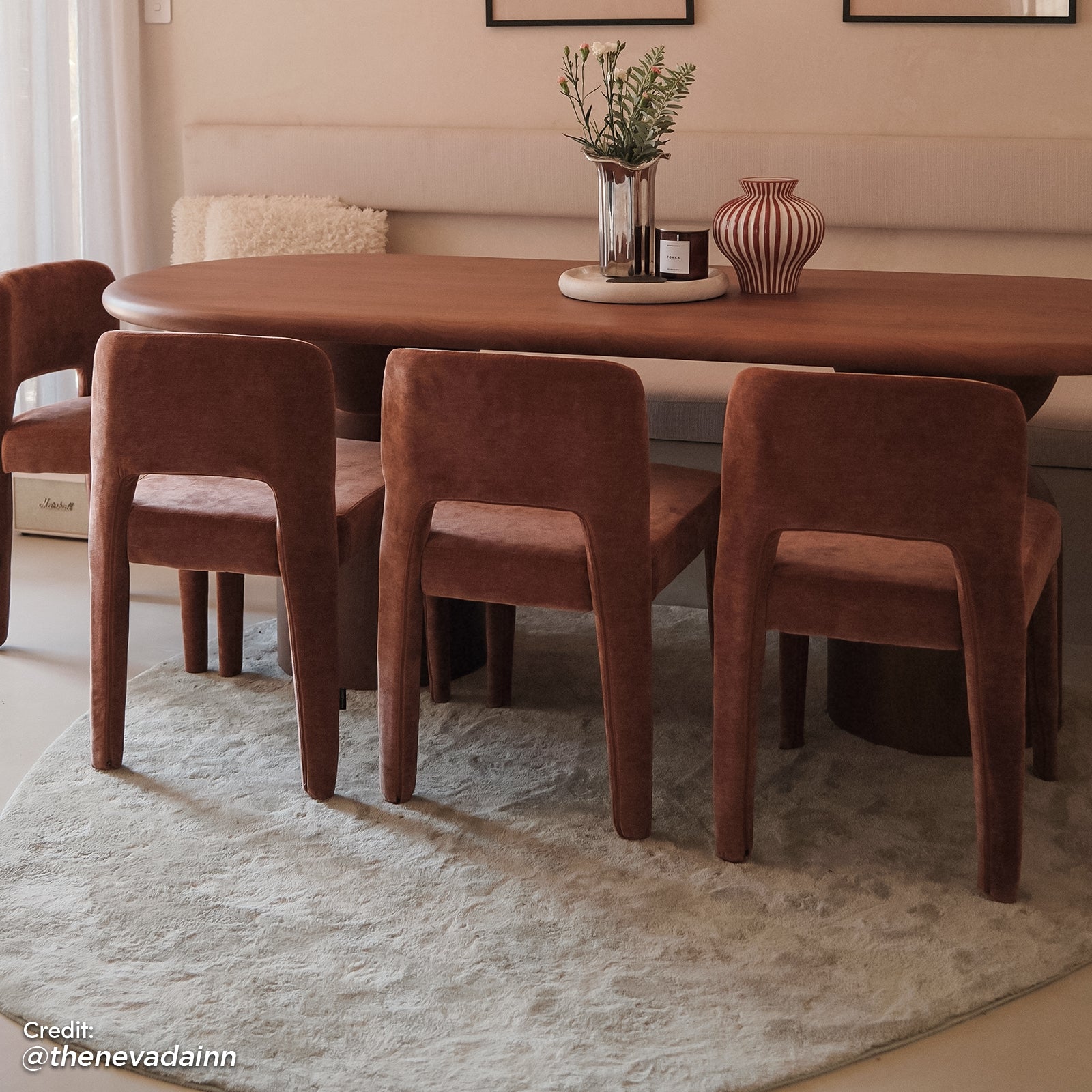 Edris upholstered leg dining chair in terracotta, set of two, shown with curved backrest and plush velvet-like fabric around
