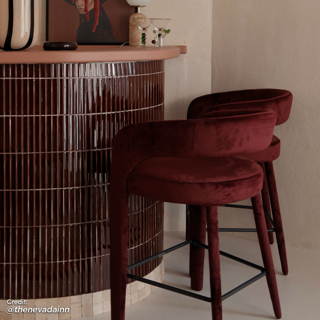 Eisha Velvet Dining Chair in Dark Plum with curved backrest and tapered legs