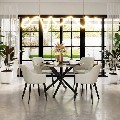 Ella Linen Dining Chair Set of 2 in Cream White, featuring light-gray upholstery, black metal legs, and a contemporary design, placed around a round dining table in a bright, modern dining area.