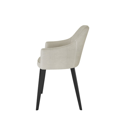 Side view of the Ella Linen Dining Chair Set of 2 in Cream White, featuring light beige fabric, gently flared armrests, and tapered black legs, showcasing a modern, upholstered dining-style design.