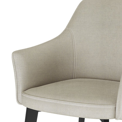 Ella Linen Dining Chair Set of 2 in Cream White features light beige fabric, gently curving armrests, padded seat, and dark-finished legs, offering a modern, comfortable design for dining spaces.