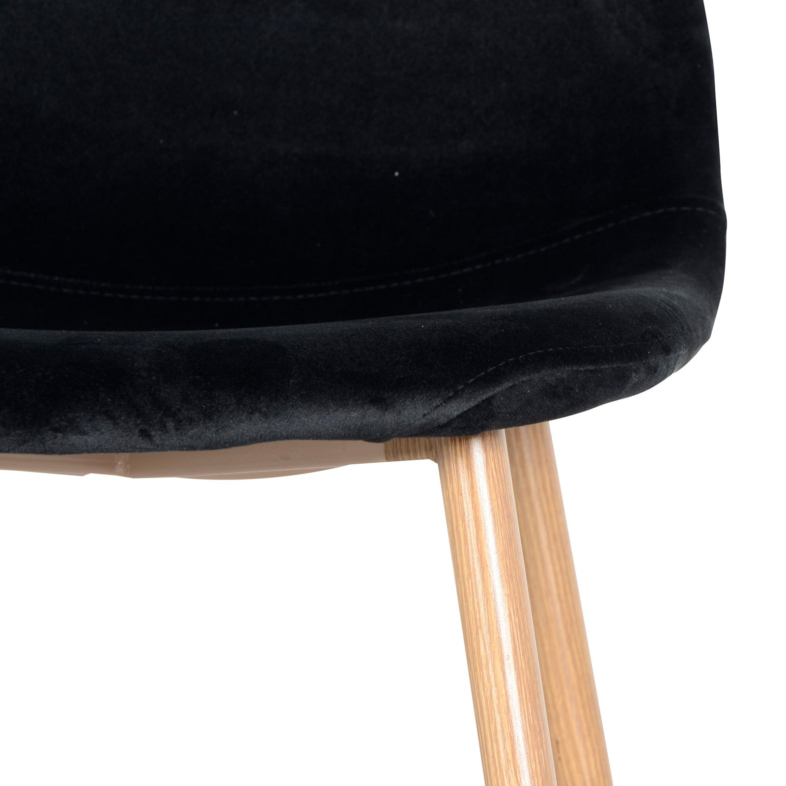 Florida Velvet Upholstered Dining Chairs (Set of 4) showcasing sleek black seats with plush velvet fabric and sturdy wooden legs, offering a modern yet luxurious touch to dining spaces.