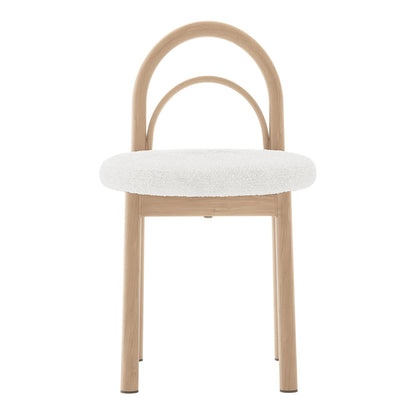 Gilles Boucle Arched Dining Chair Cream White Set of 2 featuring a close-up of its boucle fabric and thick foam padding, elegantly supported by a durable powder-coated metal frame.