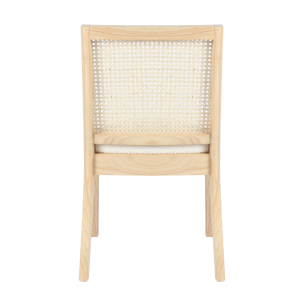 Rear view of Gretel Hardwood & Rattan Dining Chair Set of 2 in Natural, showcasing the woven cane backrest within a wooden frame, and the top edge of a lightly upholstered seat cushion.