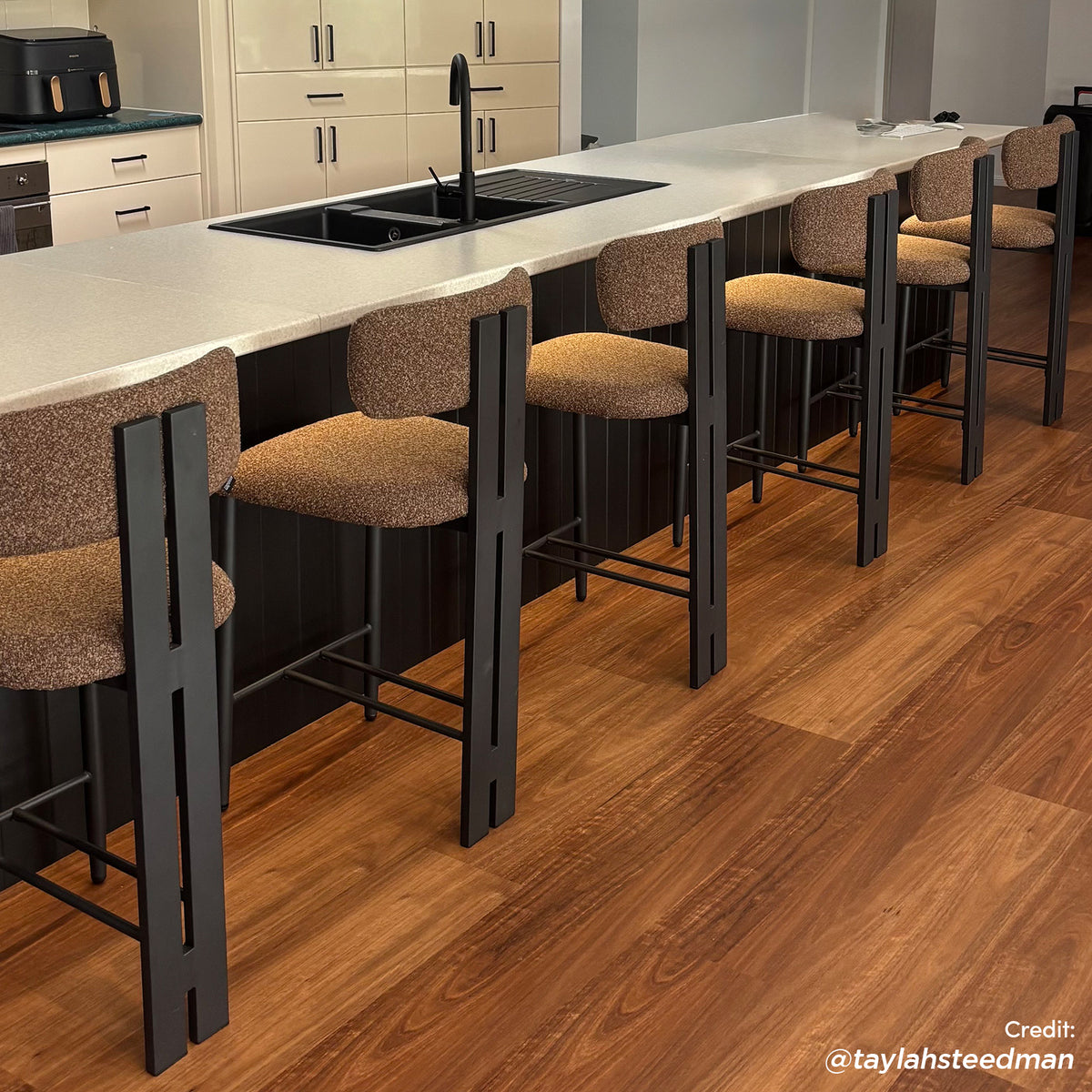 Haleo Curved Boucle Fabric Barstool in Rust Brown features textured upholstered seats, curved backrests and black metal