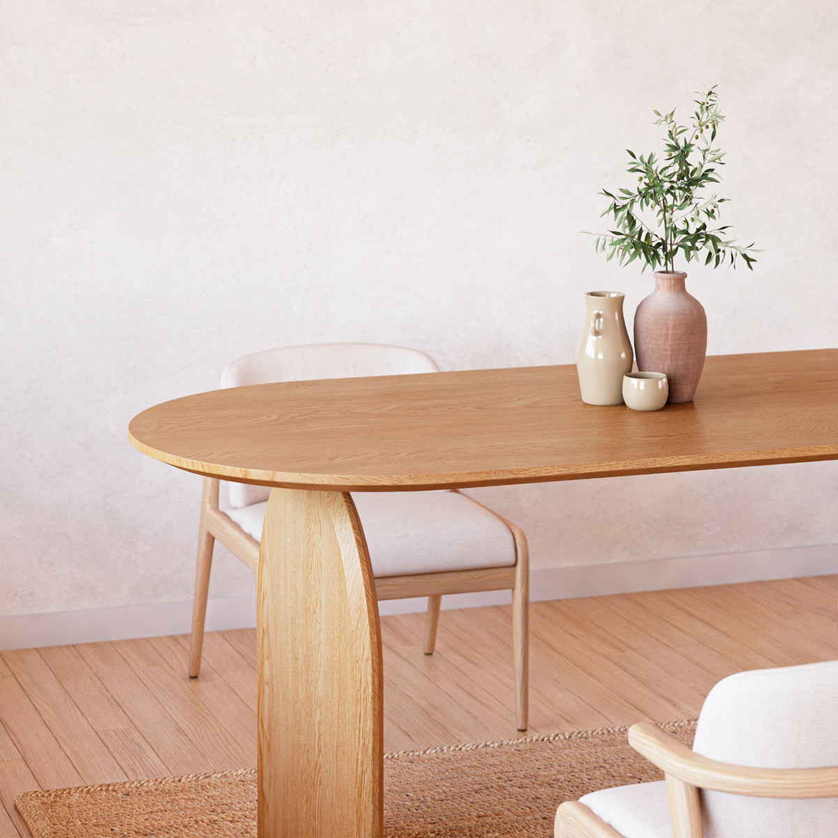 Close-up of the Jillian 180cm Solid Oak Oval Dining Table featuring elegant arched legs and a smooth oval top, highlighting its sturdy craftsmanship and modern design.