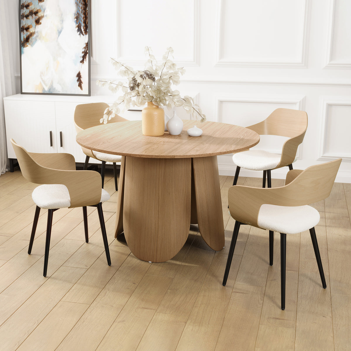 Kaylani & Winfield 5-Piece Wooden Dining Set featuring a round wooden table with white vases on top and boucle cream white chairs, highlighting modern design and cozy farmhouse charm.