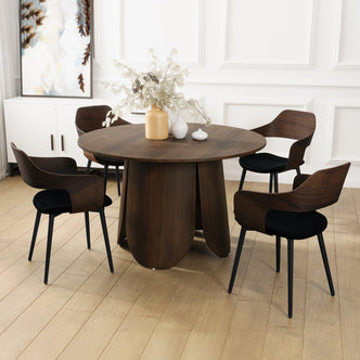 Kaylani & Winfield 5-Piece Wooden Dining Set with Velvet Chairs Walnut shown with a round wooden table and velvet chairs on a smooth floor, highlighting modern elegance and inviting design.