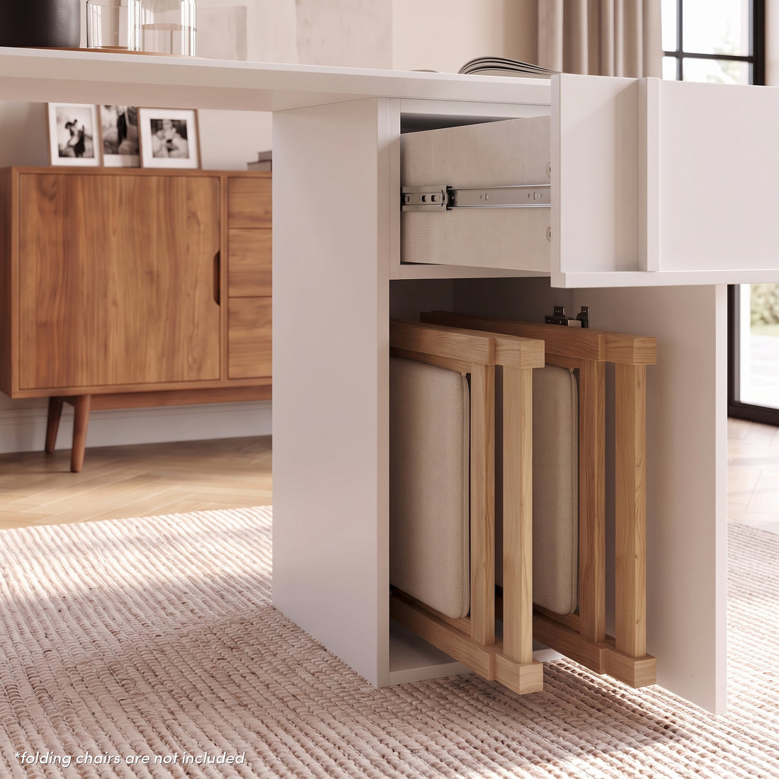 Louisa Oval Foldable Dining Table with Storage in White styled in a room setting
