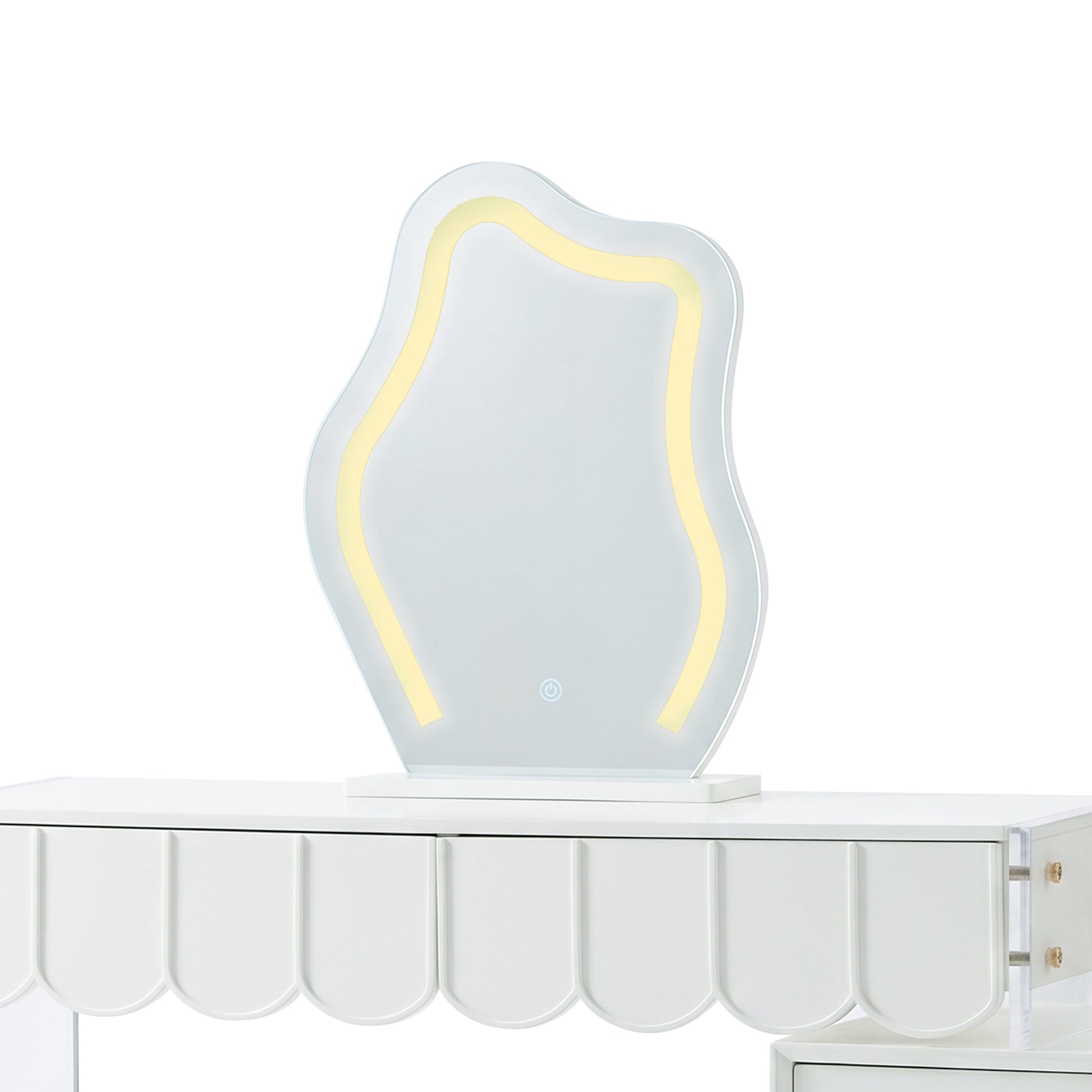 Asymmetrical illuminated dressing table mirror showing the warm light setting in studio.