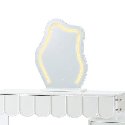 Asymmetrical illuminated dressing table mirror showing the warm light setting in studio.