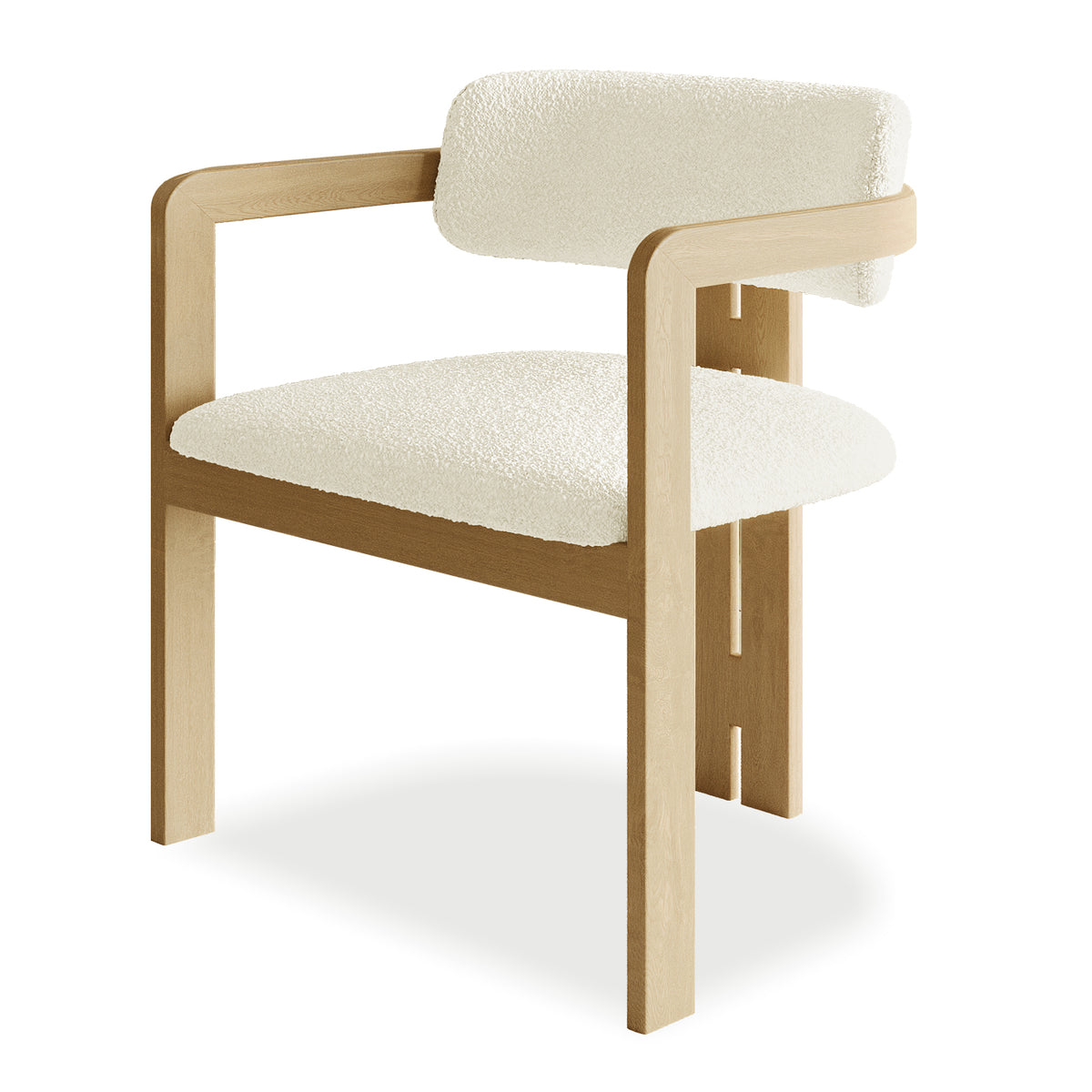 Maddi Boucle Hardwood Dining Chair Cream White with curved backrest, wooden armrests, upholstered in boucle fabric, showcasing its ergonomic design and solid American wood frame for durability.