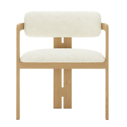 Maddi Boucle Hardwood Dining Chair Cream White with a wooden frame, featuring a curved backrest and thick cushioned seat upholstered in soft boucle fabric, showcasing a minimalist and elegant design.