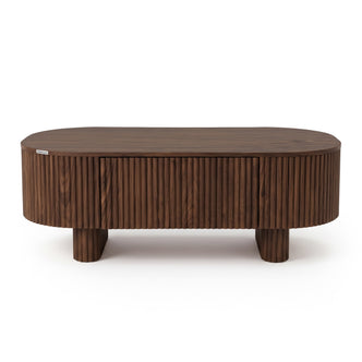Modern oval wooden coffee table with vertical grooves on a white background