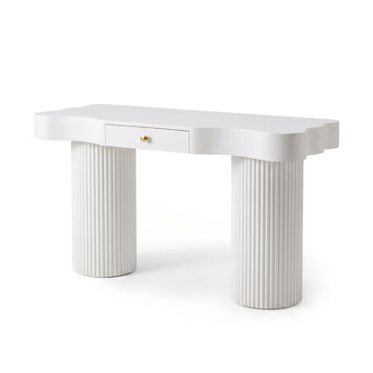 Stylish white console or vanity table with wavy edges, central drawer, and fluted column legs on a white background