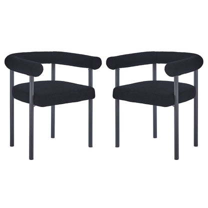 Ohio Curved Boucle Dining Chair Set of 2 in Black features low, rounded backrests and tubular armrests upholstered in black bouclé fabric, supported by sleek black metal legs for a modern look.