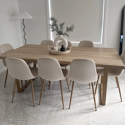 Oregon Dining Table with 8 Florida Chairs Set in Sand, light-wood table with cream upholstered chairs, woven tray centrepiece