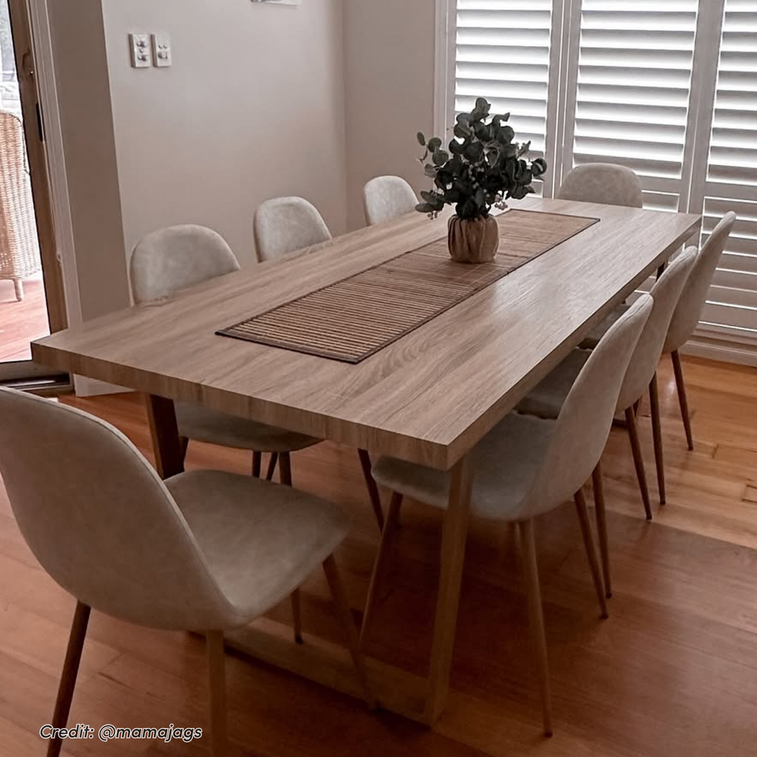 Oregon Dining Table with 8 Florida Chairs Set in Sand, featuring light-wood rectangular table with woven runner, cream
