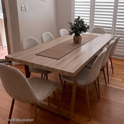 Oregon Dining Table with 8 Florida Chairs Set in Sand, featuring light-wood rectangular table with woven runner, cream