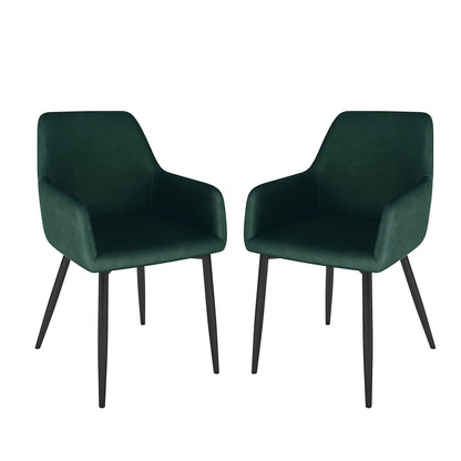 Raynie Velvet Dining Chair Set of 2 in Deep Green features modern armchairs with deep green velvet upholstery, flared armrests, and tapered black metal legs, showcasing elegance and comfort against a white background.