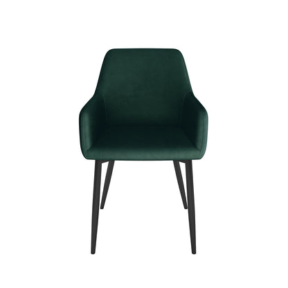 Raynie Velvet Dining Chair Set of 2 in Deep Green featuring a softly curved upholstered shell, integrated low armrests, and four slender splayed black metal legs, exuding modern elegance and comfort.