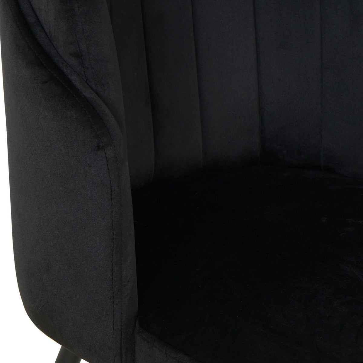 Scarlett Dining Chair Set of 6 in Black features a close-up of the chair's soft, velvet-style upholstery with vertical channel stitching on the backrest and a sleek arm design.