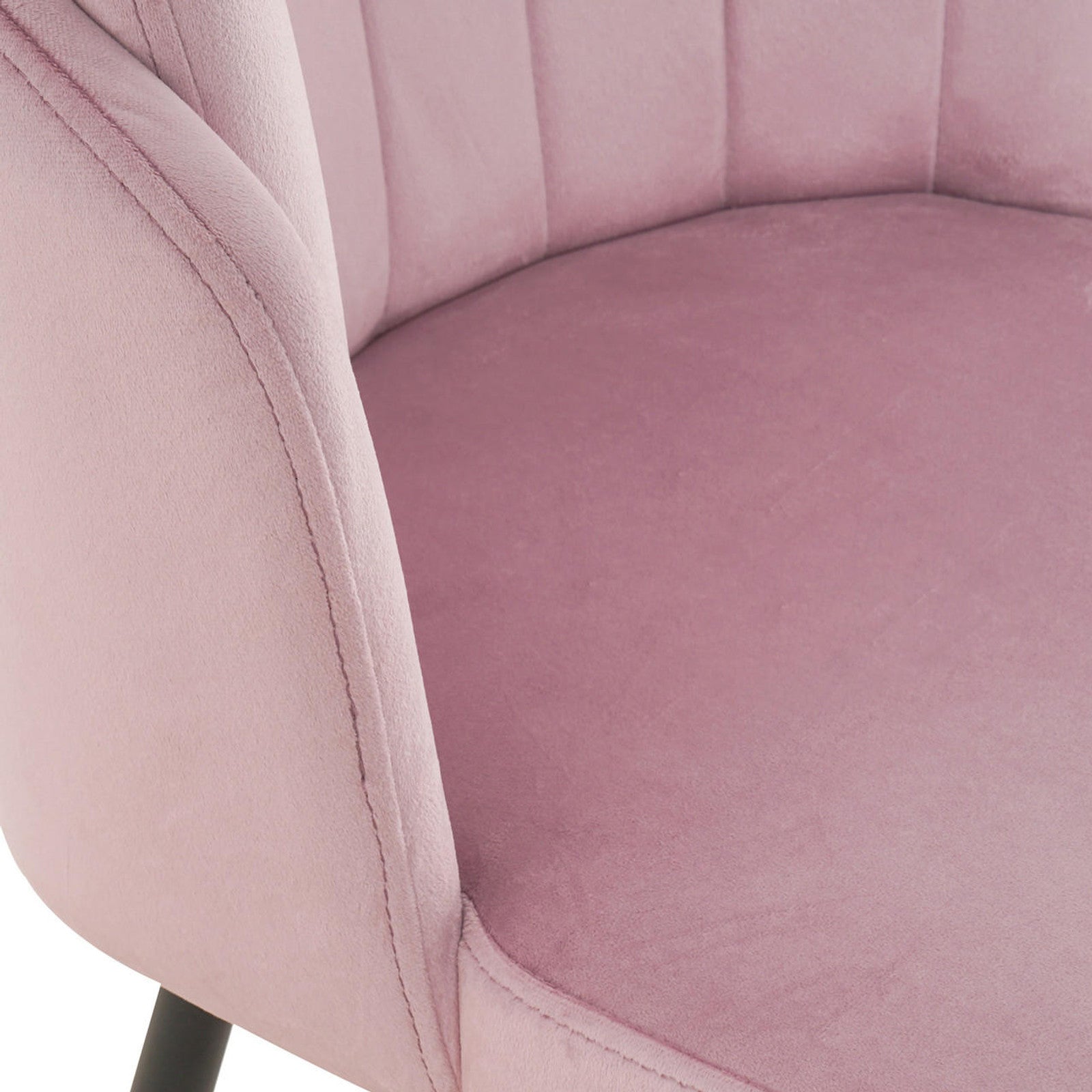 Close-up of Scarlett Velvet Dining Chair Set of 2 in Mauve Pink, showcasing the plush velvet seat, curved back, and a slender black leg, highlighting its luxurious and modern design.