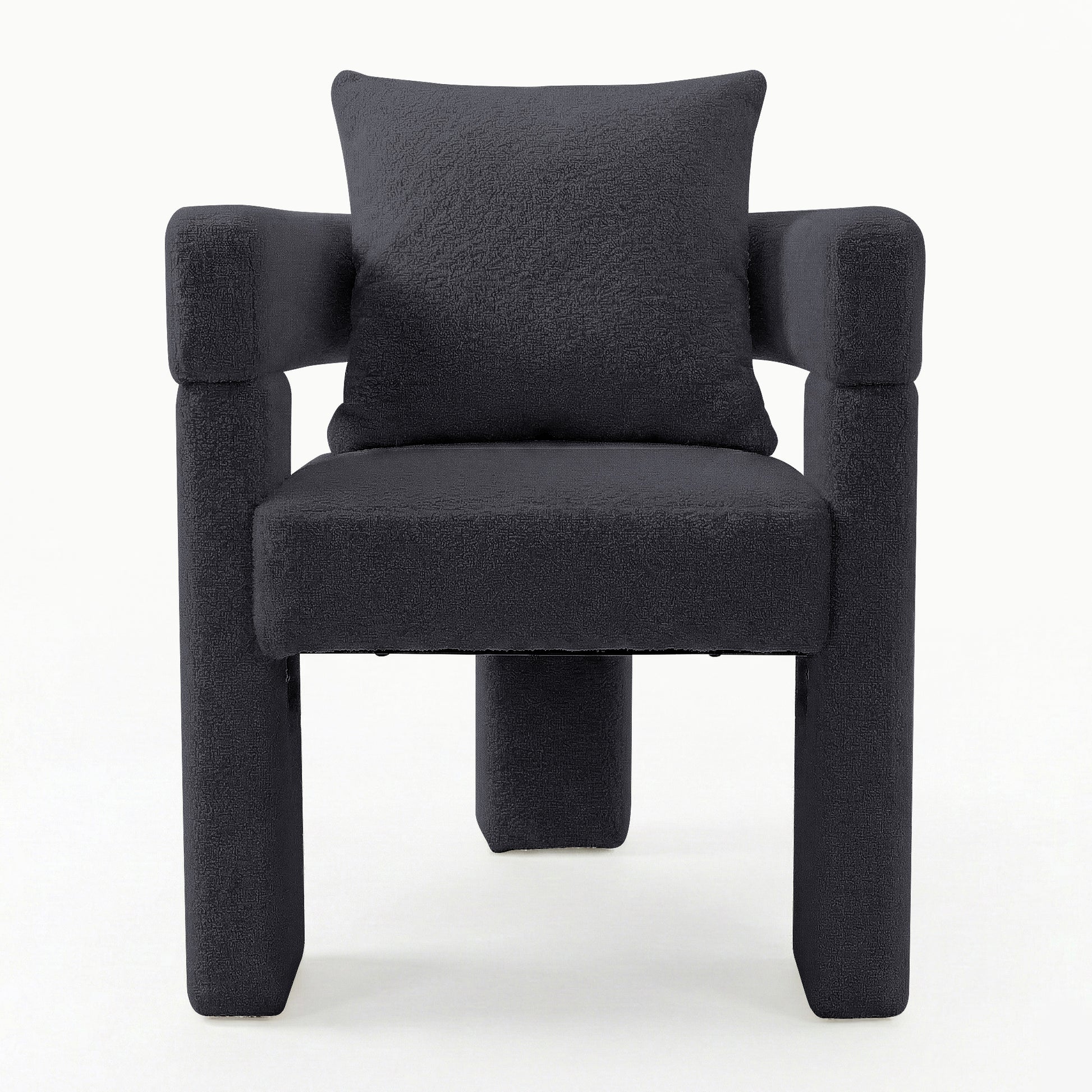 Utah Bouclé Curved 3 Legged Accent Chair in Black with tubular armrests, padded seat and high backrest