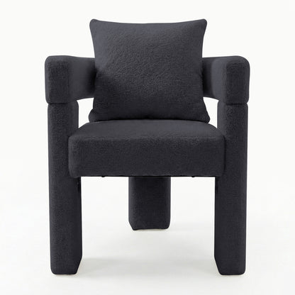 Utah Bouclé Curved 3 Legged Accent Chair in Black with tubular armrests, padded seat and high backrest