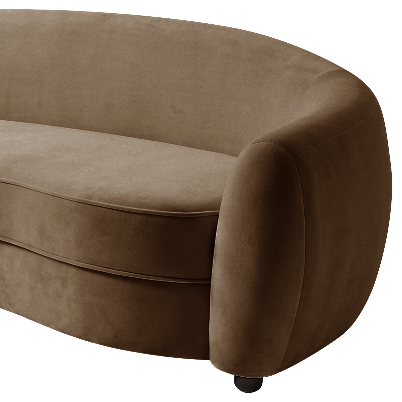 Close-up of curved arm and seat detail of warm taupe brown velvet sofa with black leg on white background