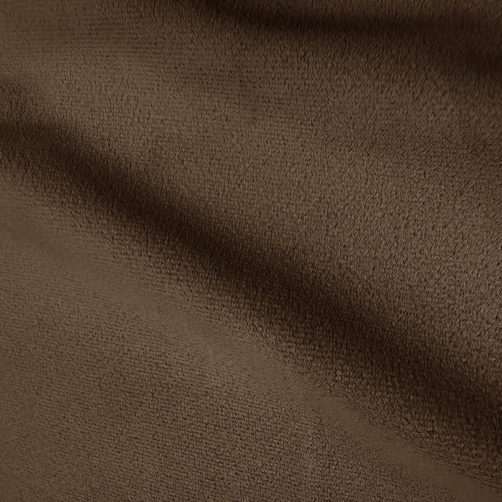 Close-up of warm taupe brown velvet upholstery texture showing soft pile and gentle shadowing