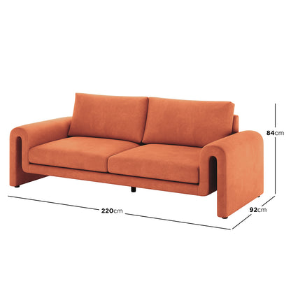Celyn 3 seater velvet upholstered sofa in burnt orange with curved armrests, 220cm wide, 92cm deep, 84cm high