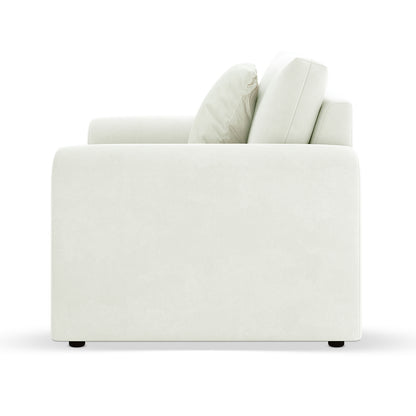 Celyn Curved Velvet Single Sofa Accent Chair in Cream, featuring a modern design with squared armrest, back cushion, lumbar pillow, and short dark feet, upholstered in light-neutral fabric for elegance.