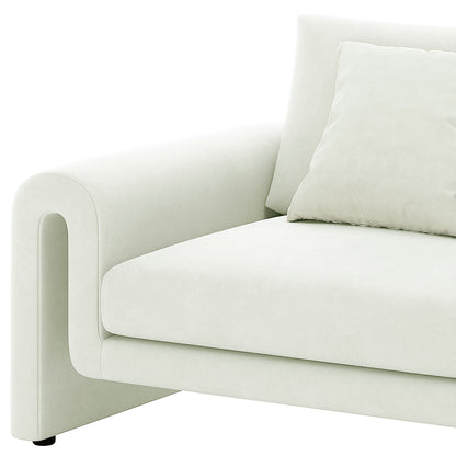 Celyn Curved Velvet Single Sofa Accent Chair in Cream, featuring a modern design with a curved armrest, plush seat cushion, and a matching throw pillow, perfect for luxurious comfort and elegance.