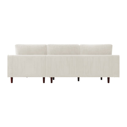 Claude 3 Seater Velvet Sofa with Chaise – Cream, featuring plush cushions, wooden legs, and a spacious chaise design. The elegant velvet upholstery adds luxury and comfort to any living space.