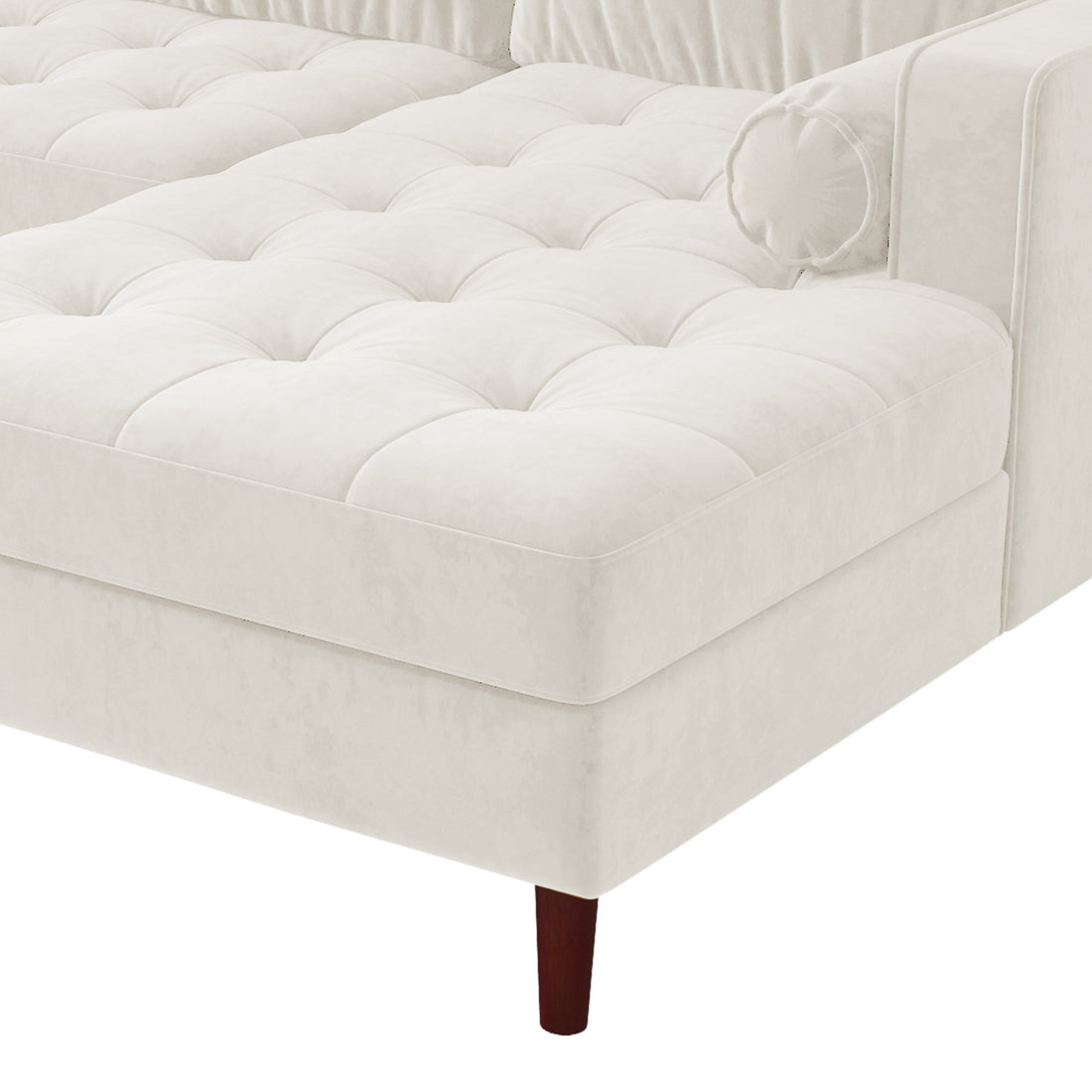 Close-up of the Claude 3 Seater Velvet Sofa with Chaise in cream, highlighting its plush cushions and spacious chaise design, providing a luxurious and comfortable seating experience for any living room.