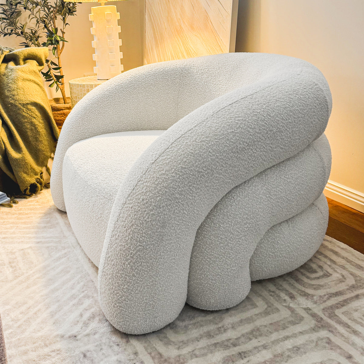 Lifestyle image of Clioz Bouclé 4 Seater Curved Lounge Package Eggshell White
