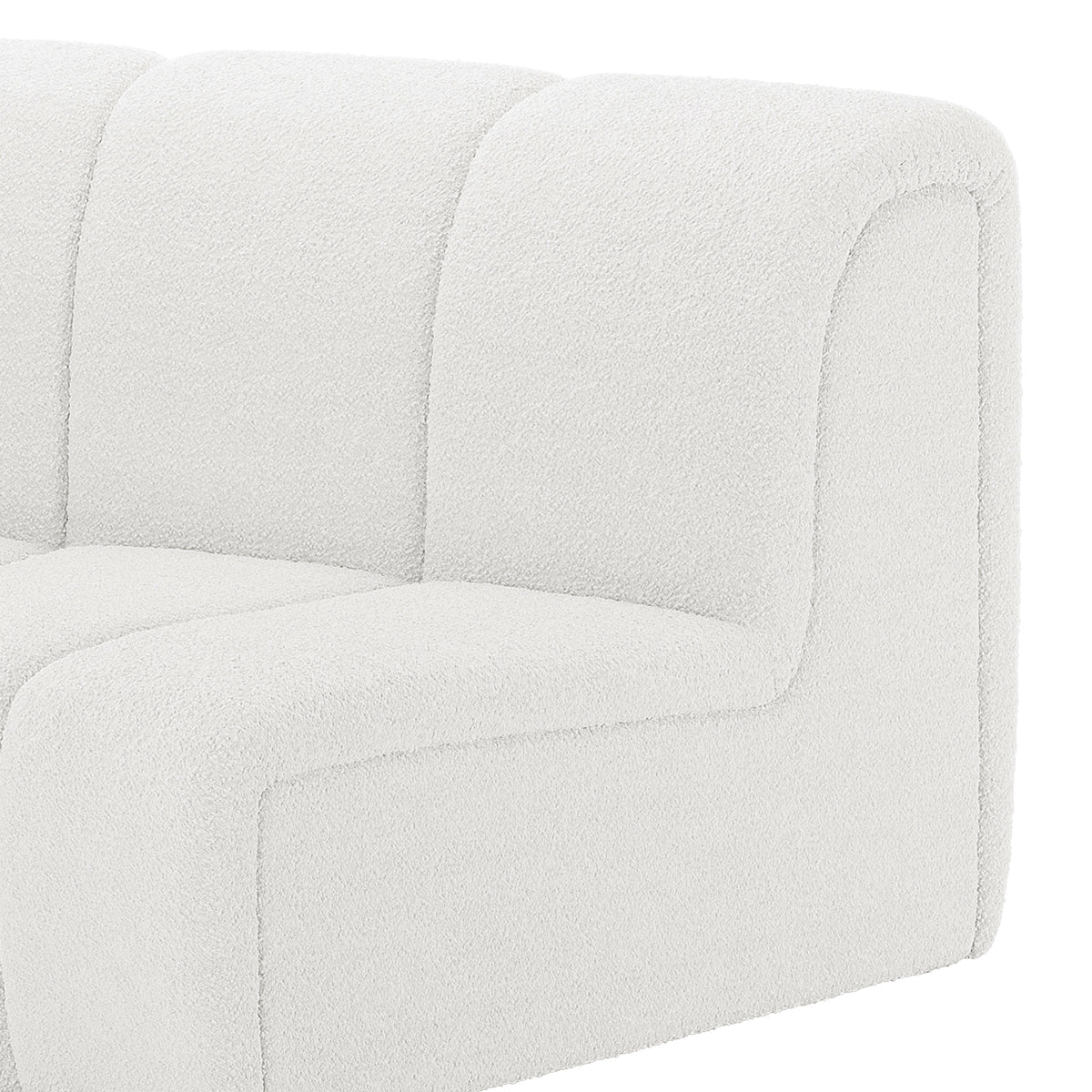 Corina 4 Seater Modular Boucle Sofa in Cream White, showcasing a close-up of its textured fabric, rounded edges, and channel-stitched padding on the backrest and seat for a modern, cozy appeal.