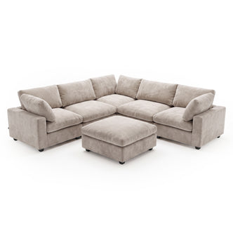 A modular corner sofa in a in Soft Greige, plush fabric, featuring deep seats, comfortable back cushions, and a matching square ottoman positioned in front