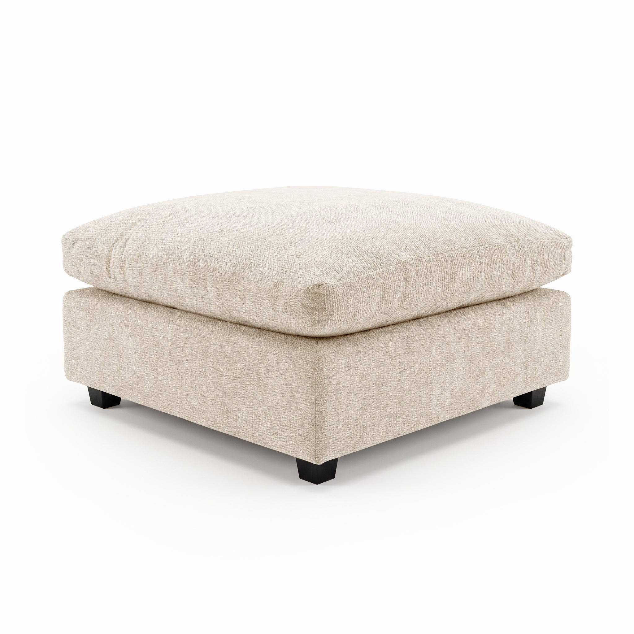Beige upholstered ottoman with plush cushion on a white background