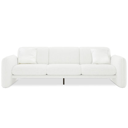 Ivano 4 seater boucle upholstered sofa in cream white with curved armrests, three seat cushions, and black metal centre leg