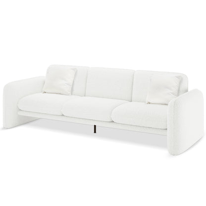 Ivano 4 seater boucle upholstered sofa in cream white with curved armrests, two seat cushions, two back cushions and black