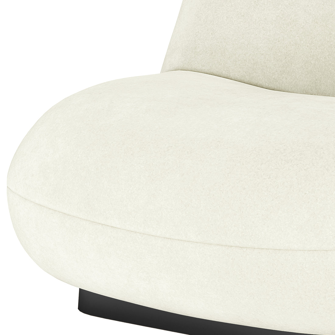 Close-up of cream velvet swivel accent chair seat with curved edges and black base