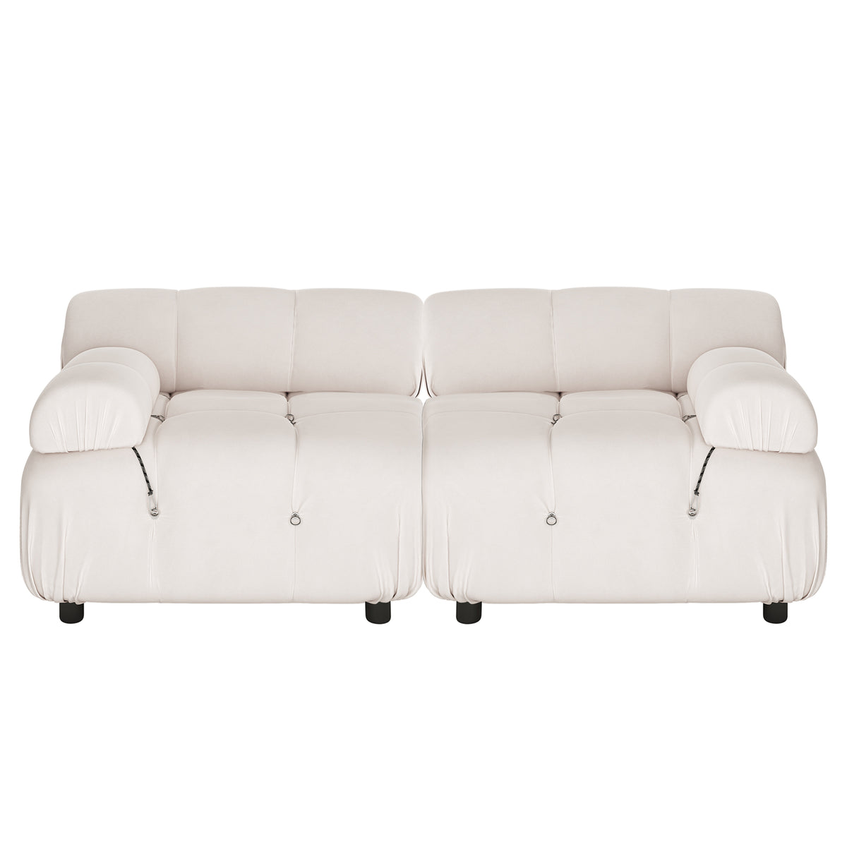 Keila 2 Seater Modular Tufted Sofa Set in Cream Velvet features a low-slung, puffy silhouette with tufted cushions, wide padded armrests, and short dark legs, exuding a contemporary, cozy charm.