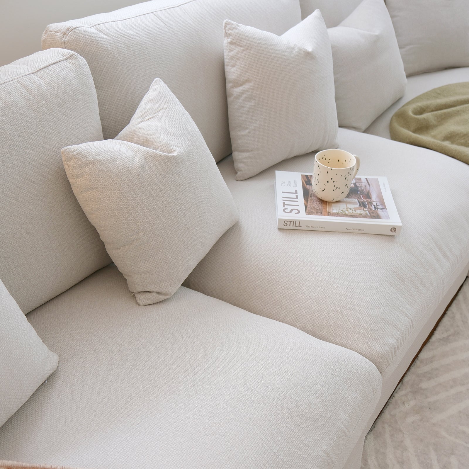 Close-up of the Millie 5-Seater Fabric Modular Sofa in light grey, showcasing its plush cushions and versatile corner design, ideal for cozy lounging and stylish living room settings.