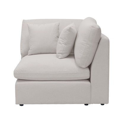 Millie 6-Seater Fabric Corner Chaise Sofa featuring plush cushions and modular design, highlighting comfort and style in a warm light grey upholstery.