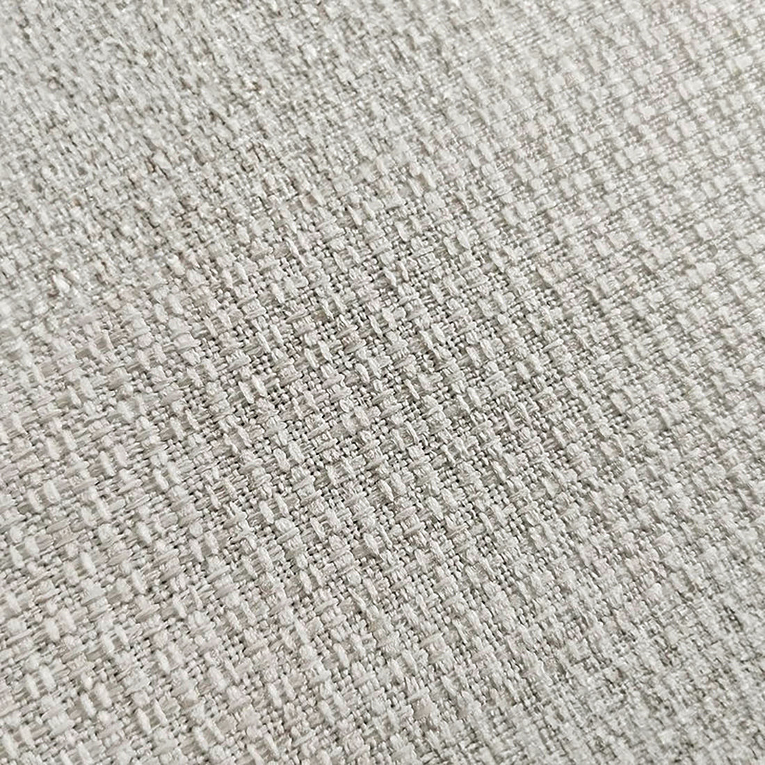 Millie Fabric Ottoman Modular Sofa Light Beige, showcasing a close-up of its plush, textured fabric surface, highlighting the luxurious softness and intricate, durable weave of the CleanGuard linen.