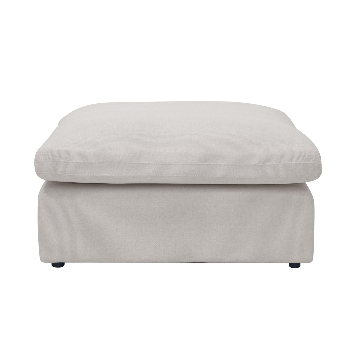 Millie Fabric Ottoman Modular Sofa in warm light grey, showcasing its smooth linen texture and plush, thick foam padding, highlighting its deep seating and robust timber frame construction.